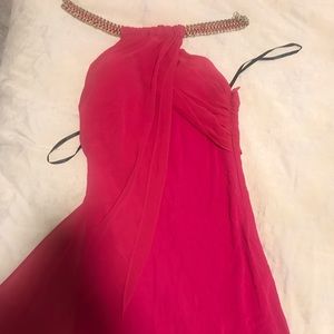 Bebe short cocktail dress with chain detail.